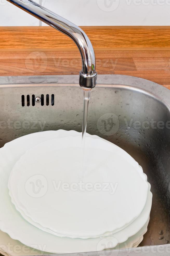 wash-up in metal washbasin photo