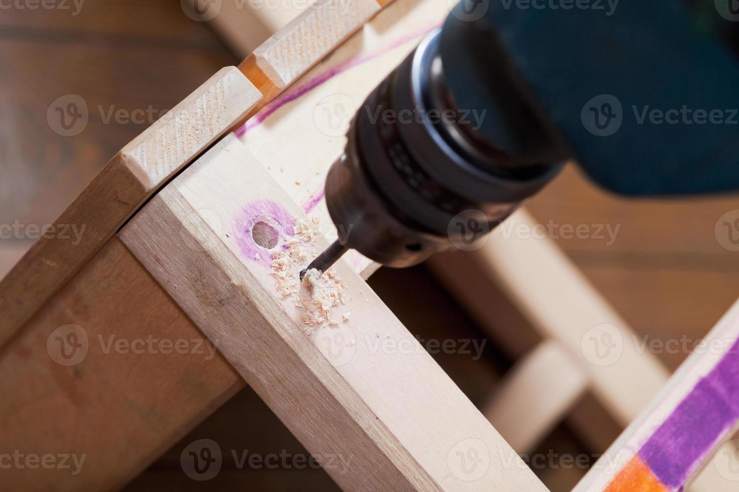 repair chair with drill photo