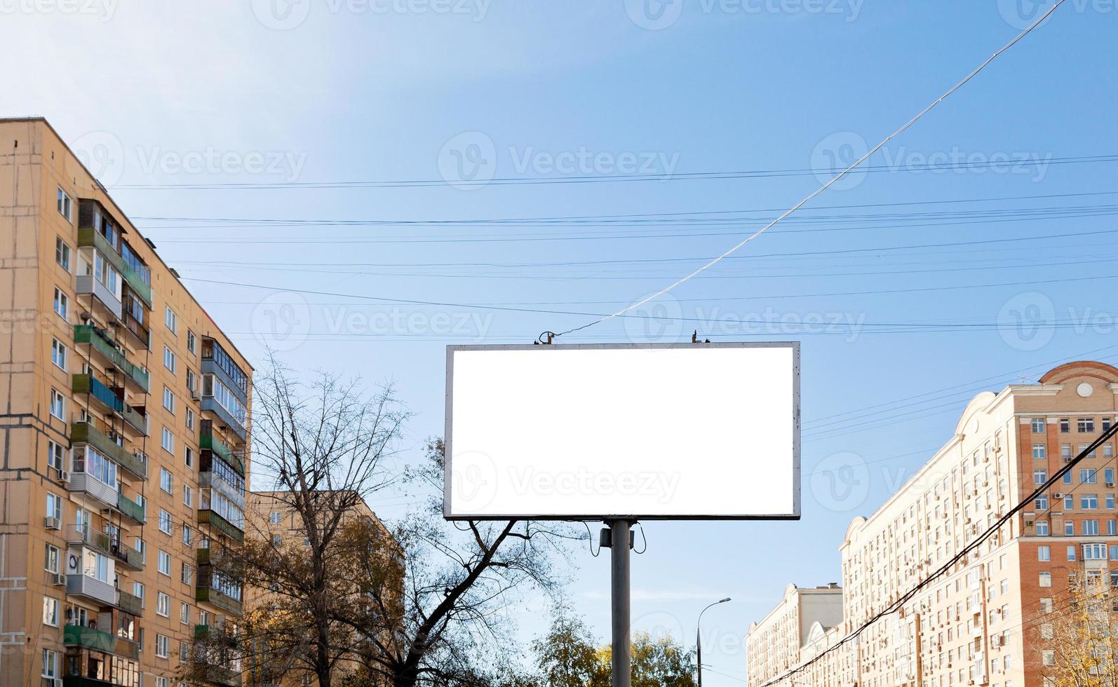 white cut out advertisement billboard outdoors photo