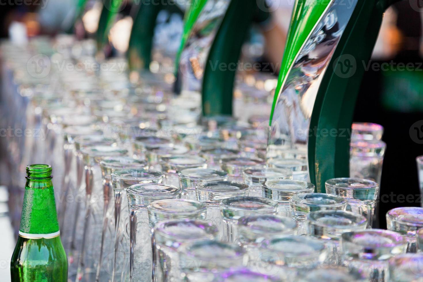 bottle and glasses for beer photo