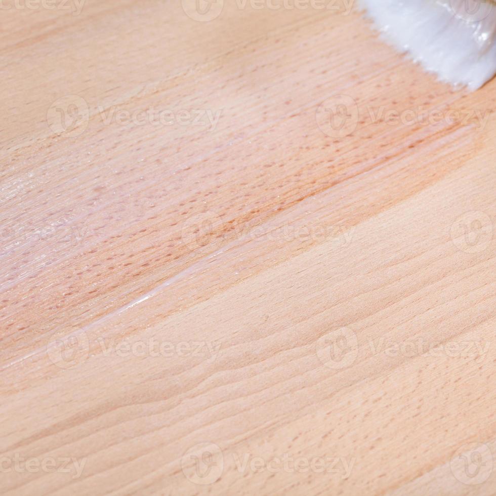 clear varnish on surface of beech worktop photo
