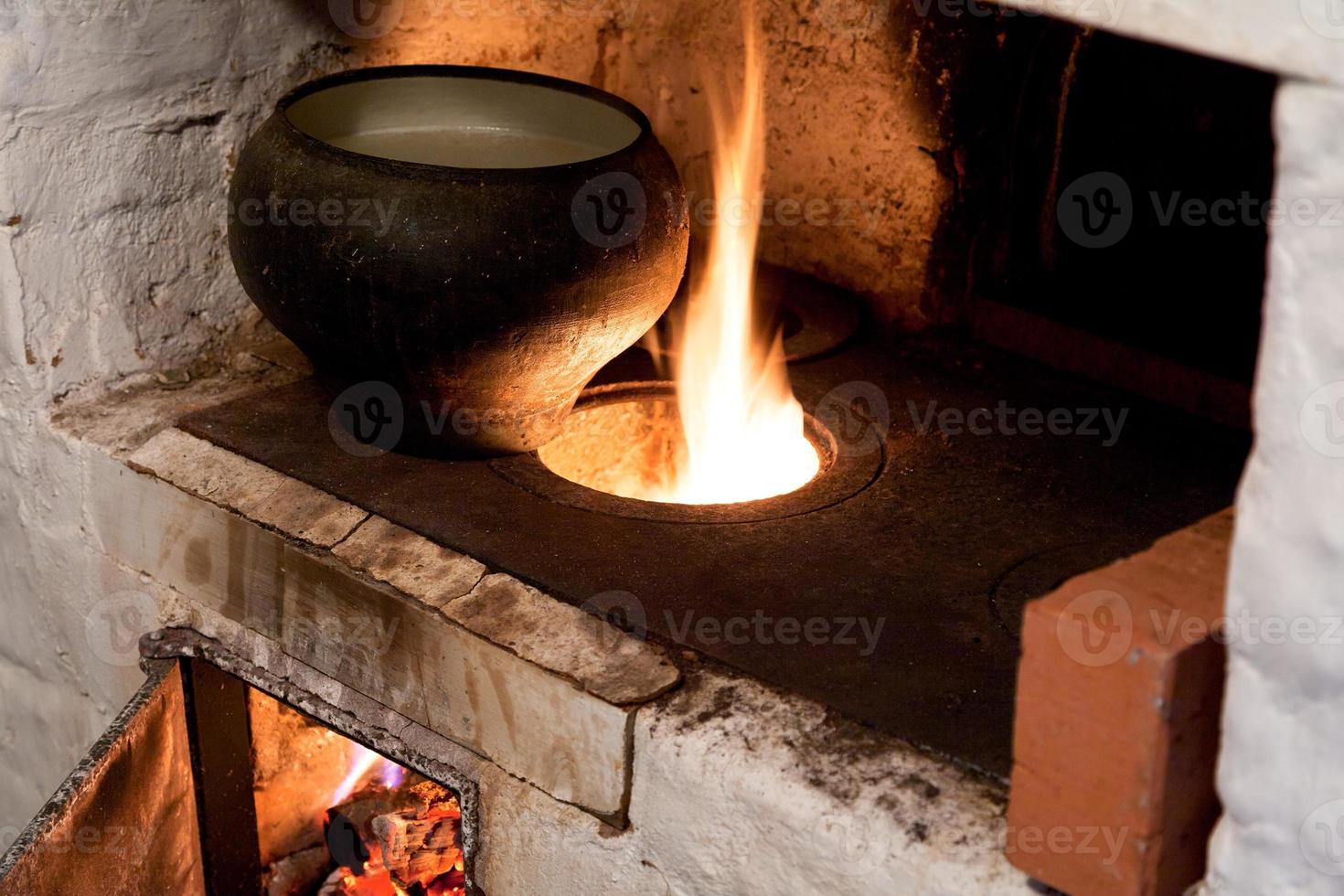 oven and old cast-iron pot photo