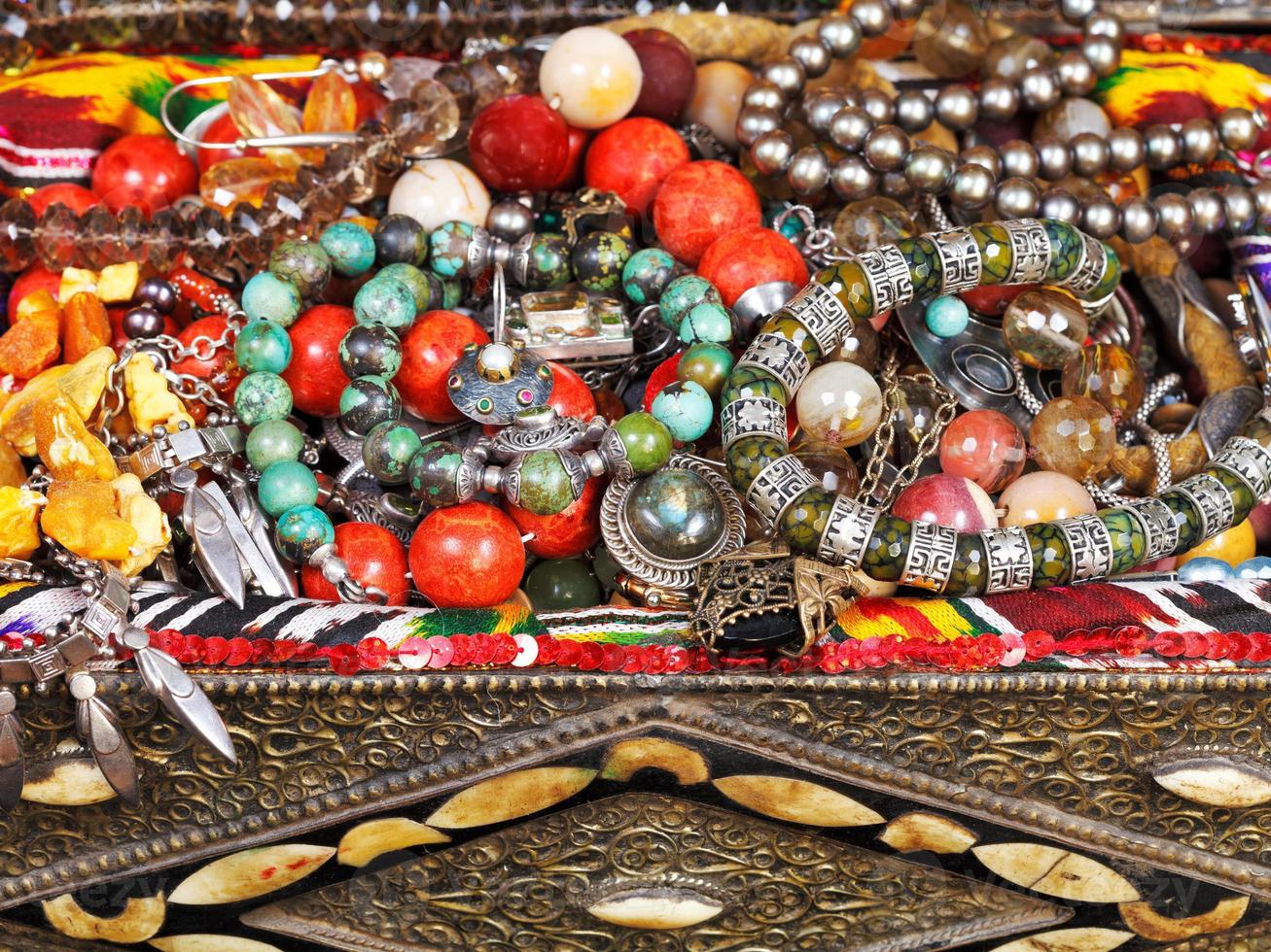 antique jewelry in ancient treasure chest photo