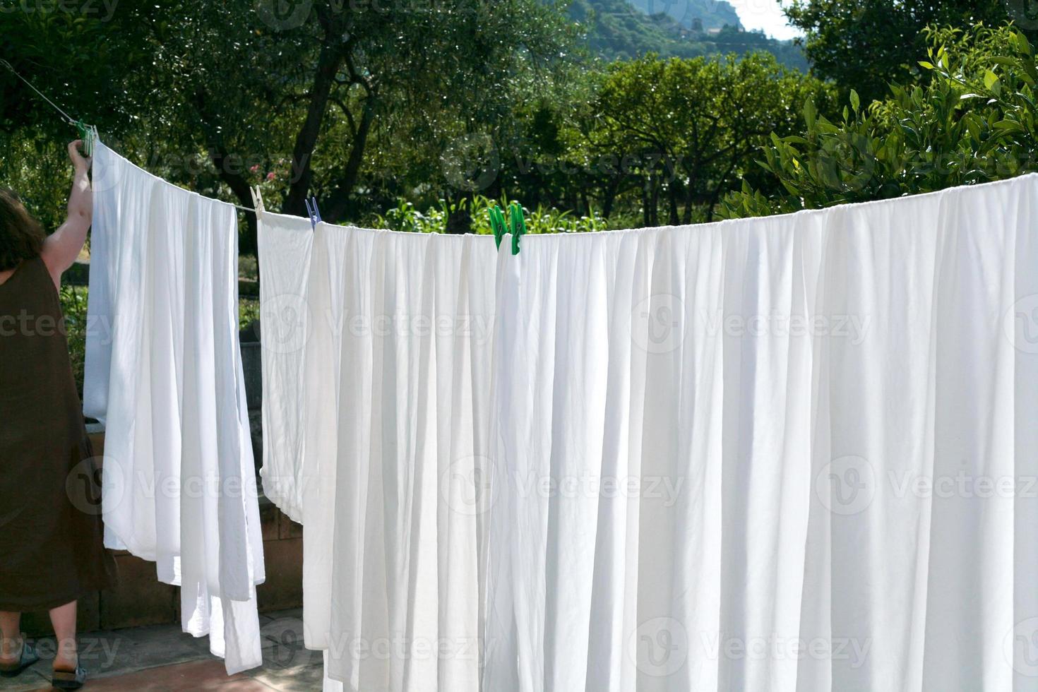 drying of white linens photo