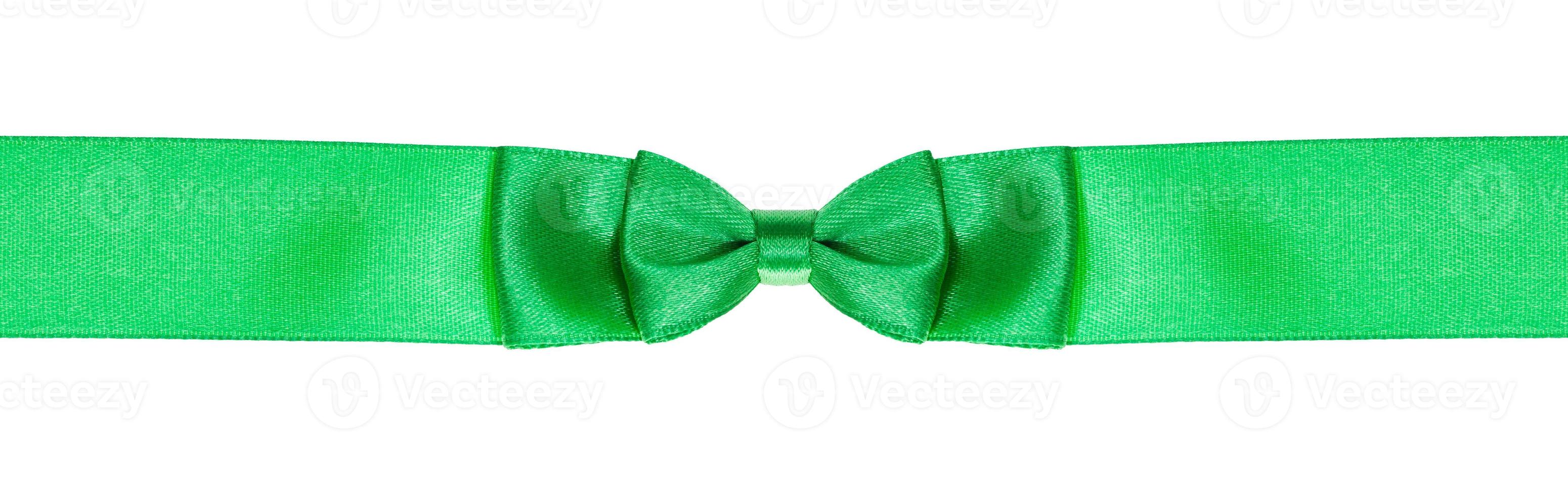 double bow knot on narrow green satin ribbon photo
