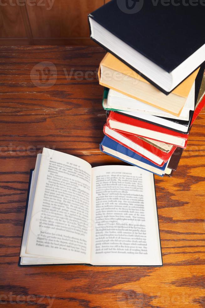 open book on wooden table photo