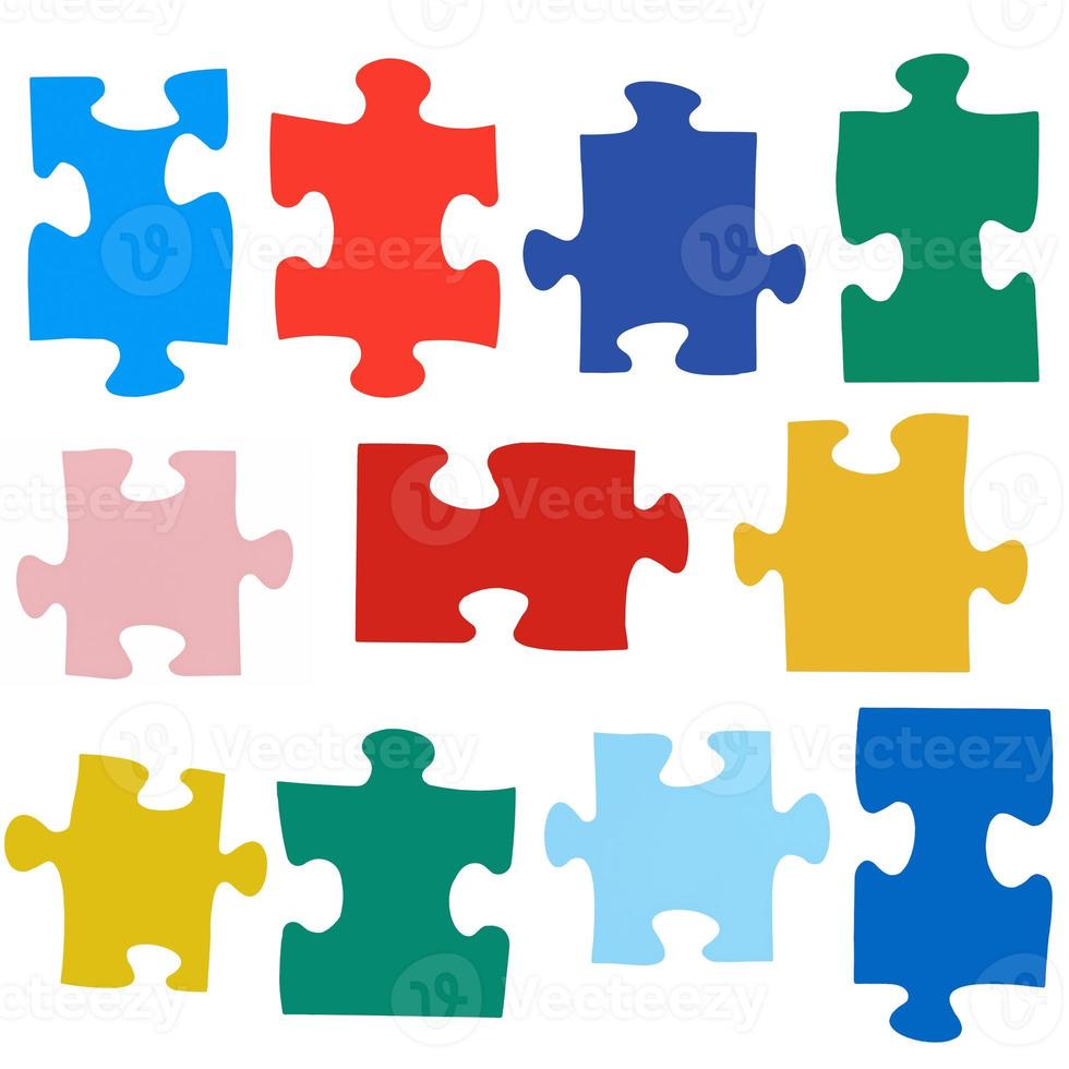 set of different colored puzzle pieces photo