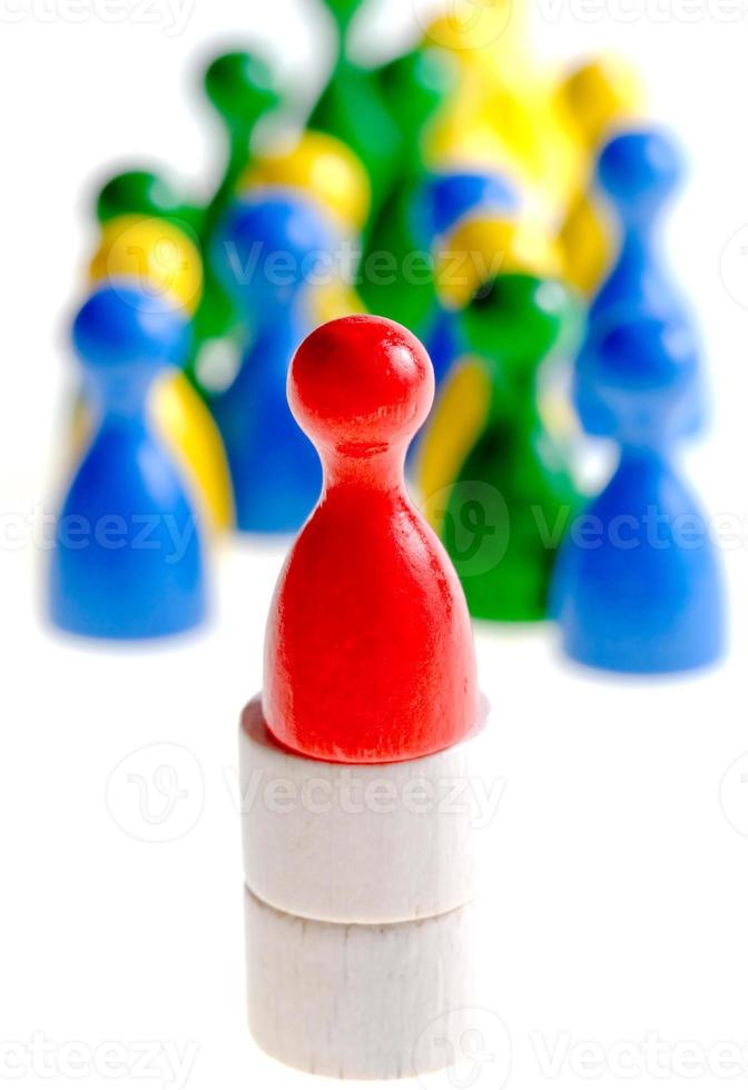 followers by wooden figurines isolated photo