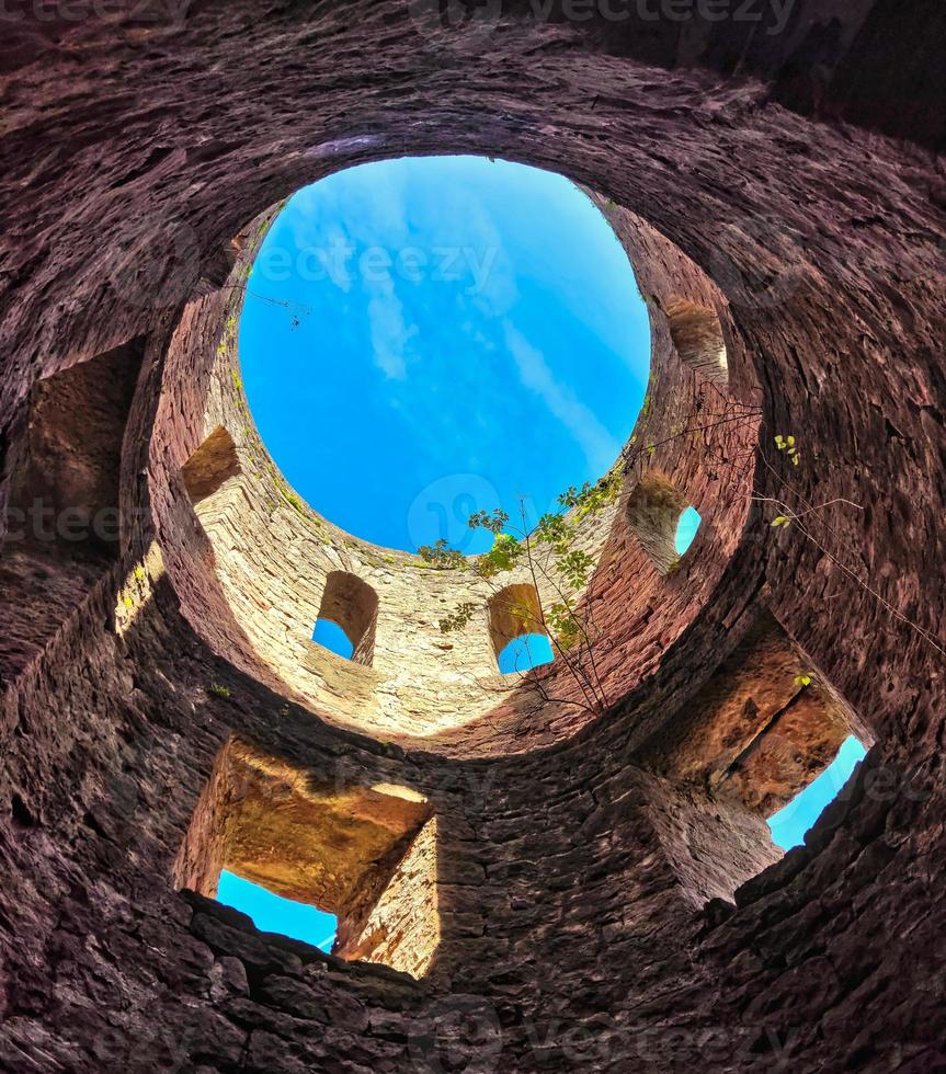 A medieval tower of an old castle ruin photo