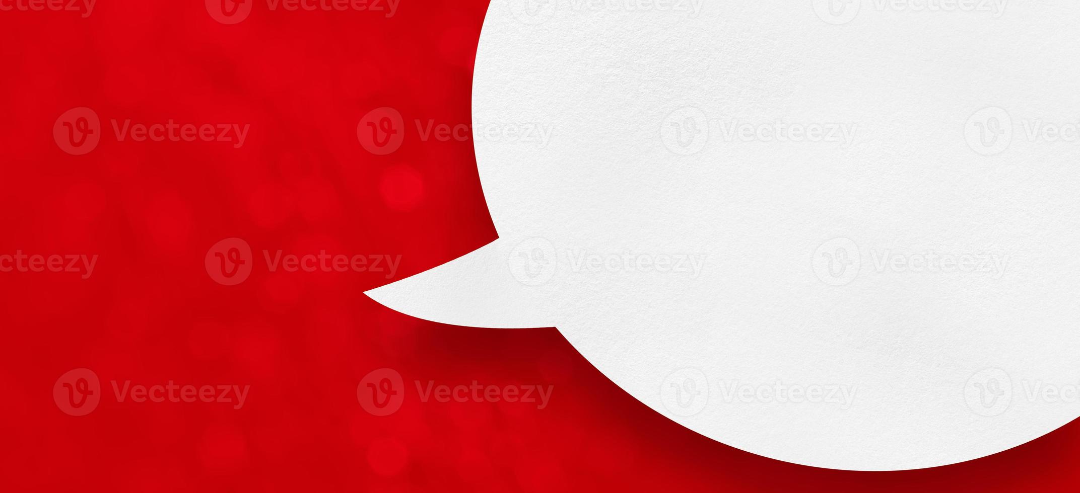christmas white paper speech bubble on red bokeh background photo