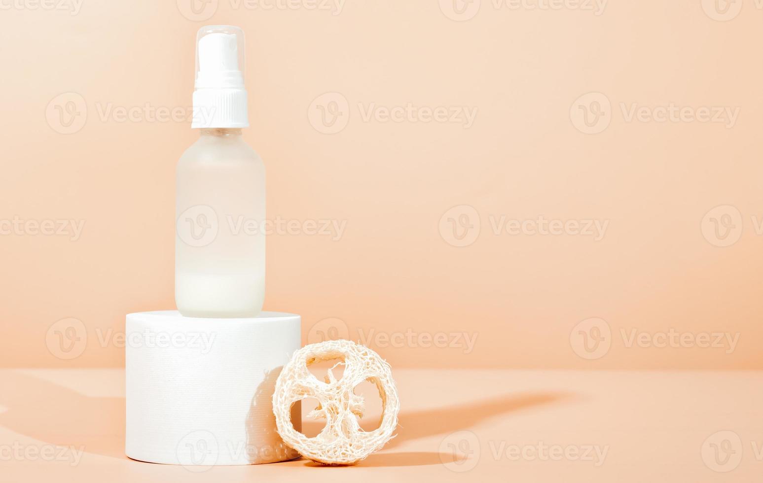 bottle with enzyme peeling solution, two phase treatment serum with fermented cosmetic product. neutral beige background, copy space photo