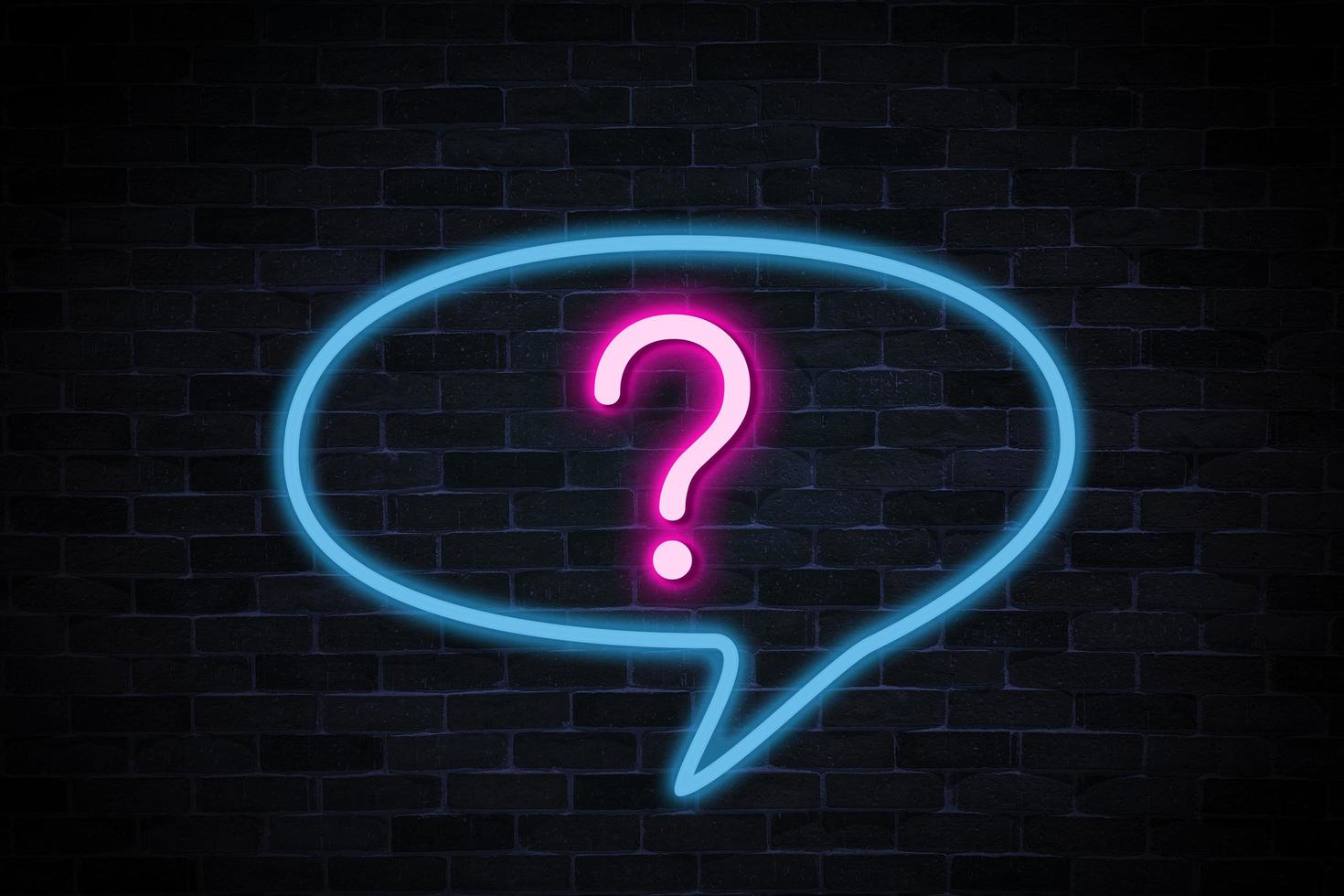 Question sign symbol neon banner on brick wall background with copy space. photo