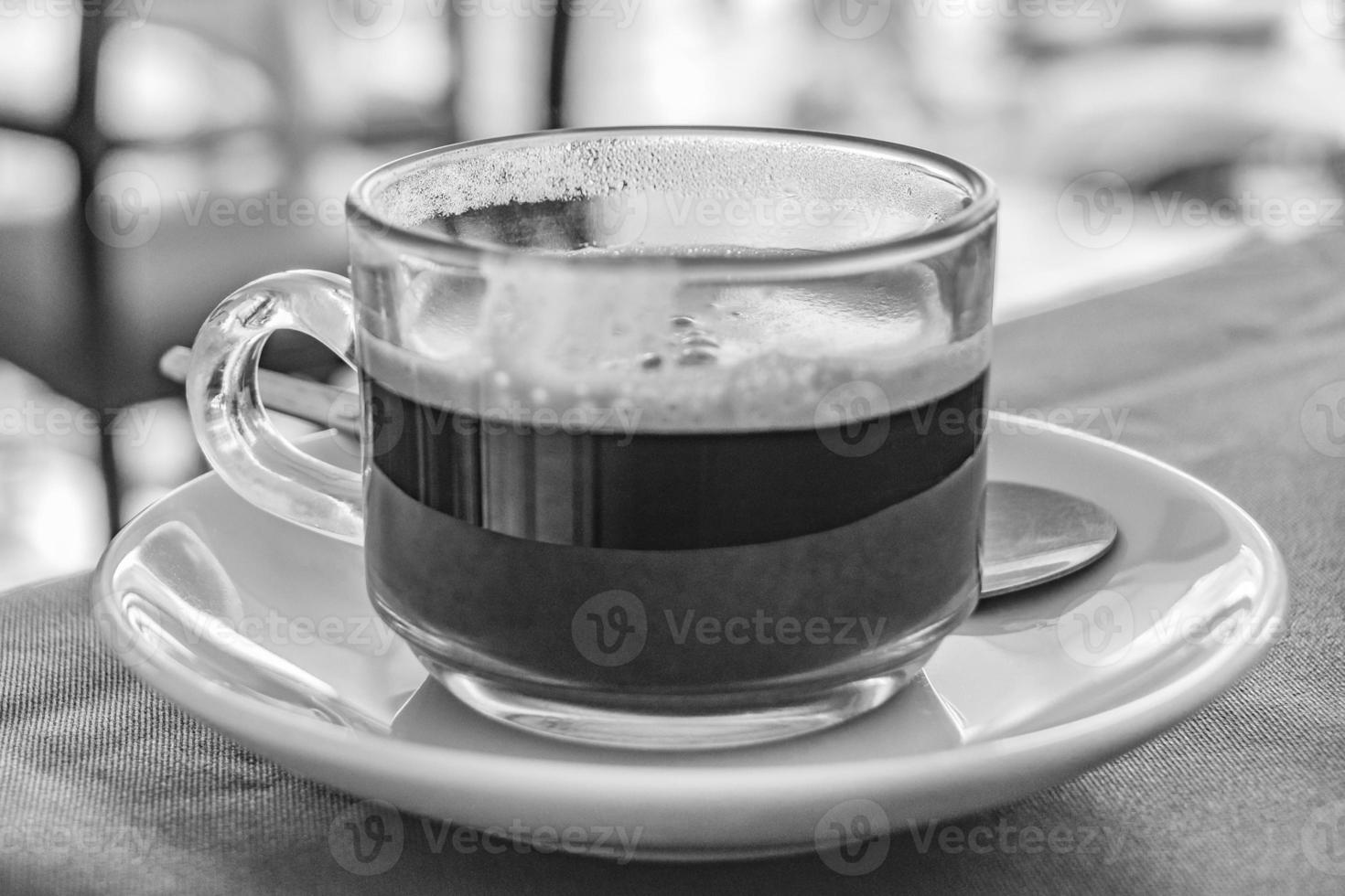 Glass Cup of black coffee in a restaurant Phuket Thailand. photo
