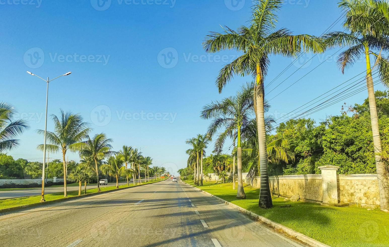Typical street road and cityscape of Playa del Carmen Mexico. photo