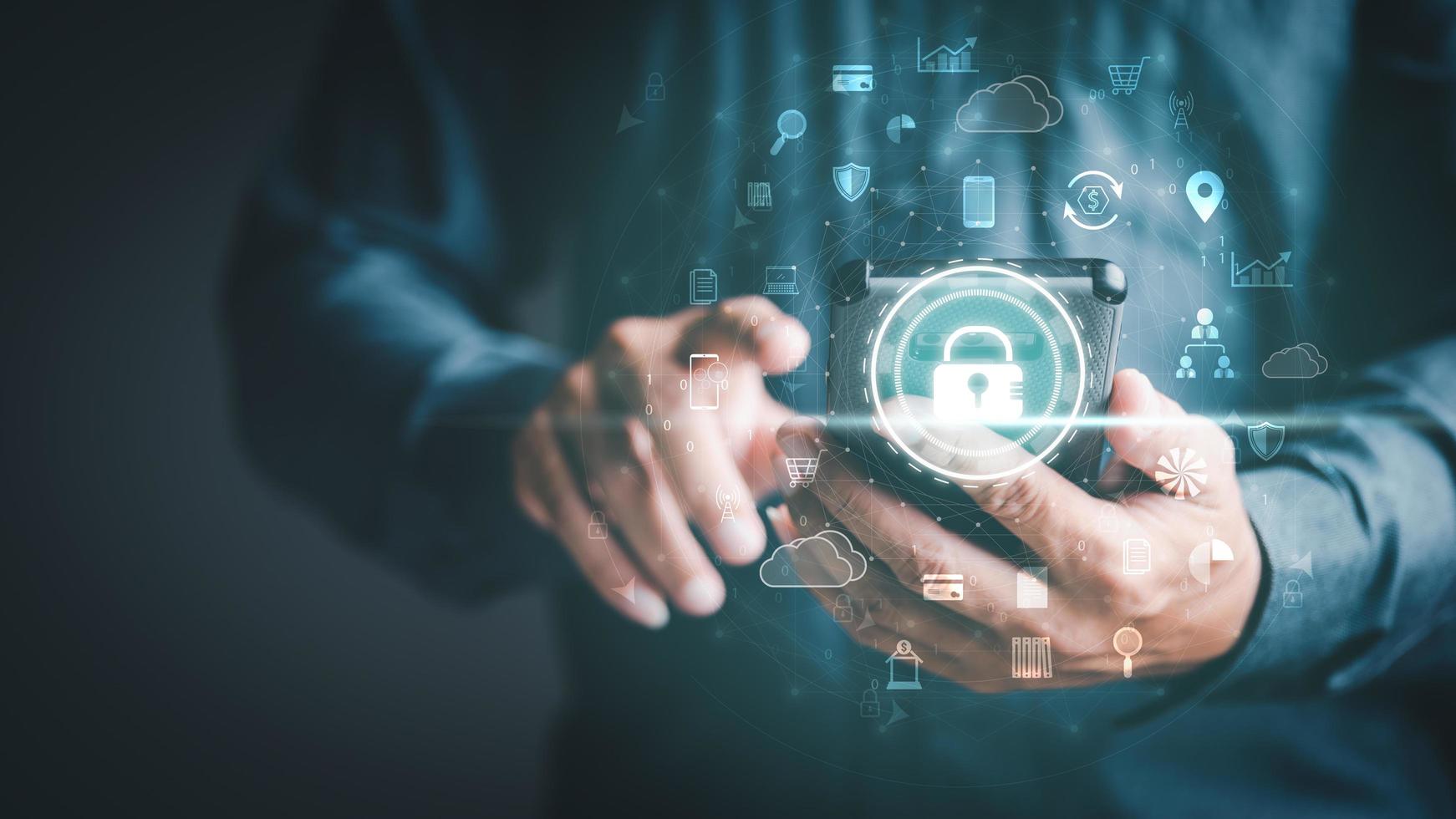 Businessmen use smartphones to connect data through authentication and privacy devices, online security protection technology, password authentication and cybersecurity photo