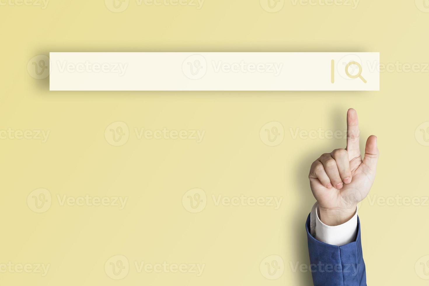 Businessman's finger pointing at internet search page on virtual touch screen Earth tone yellow background, search for internet surfing information network concept, education, knowledge, copy space photo