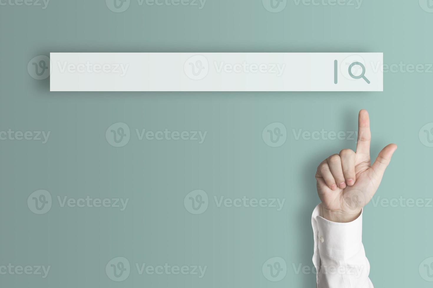 Businessman's finger pointing to internet search page on virtual touch screen blue earth tone background, search for internet surfing information network concept, education, knowledge, copy space photo