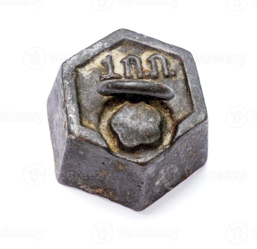 The ancient of 1 KG. Steel weight pendulum on white background. photo