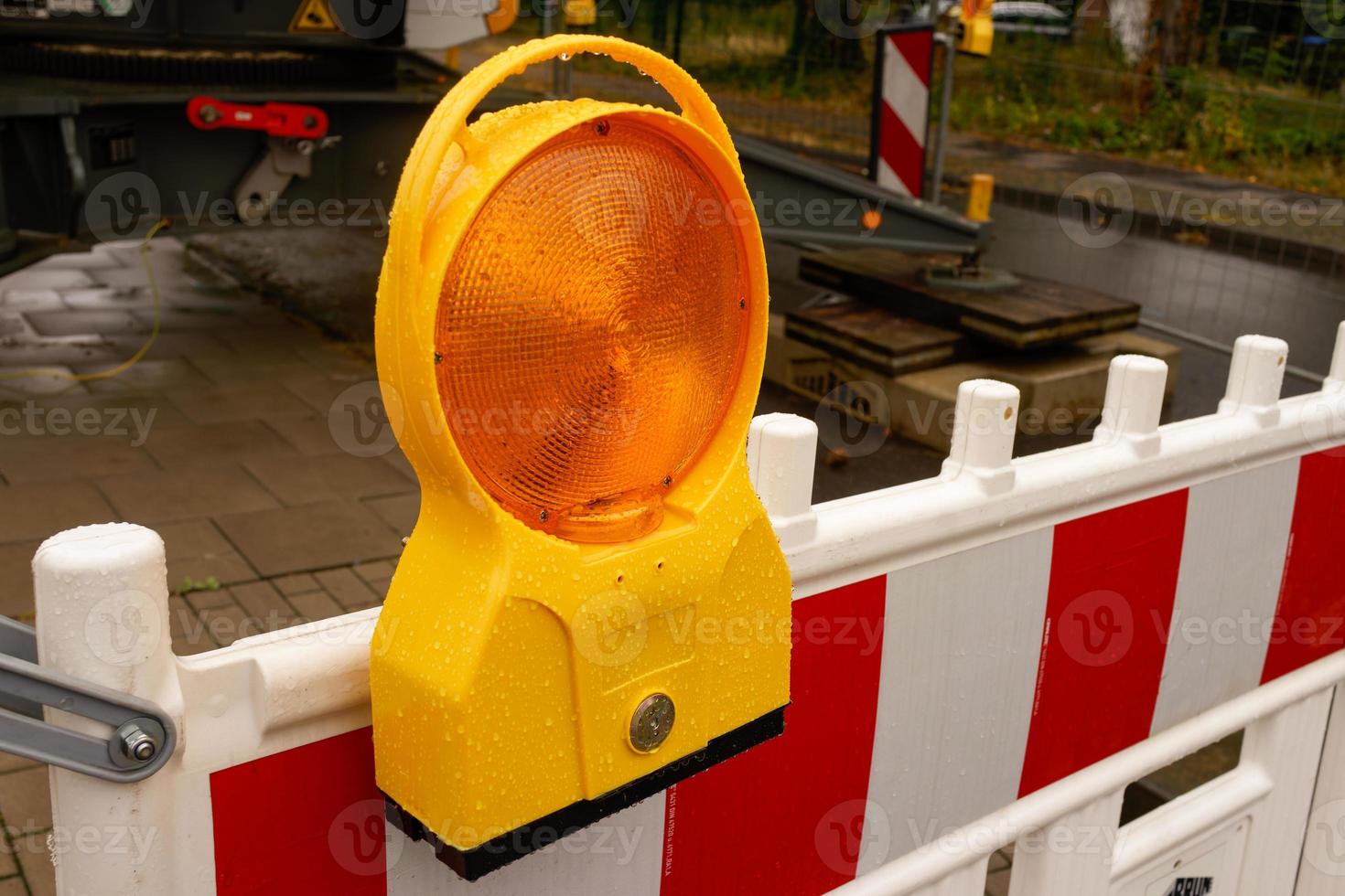 orange warning light on barrier photo