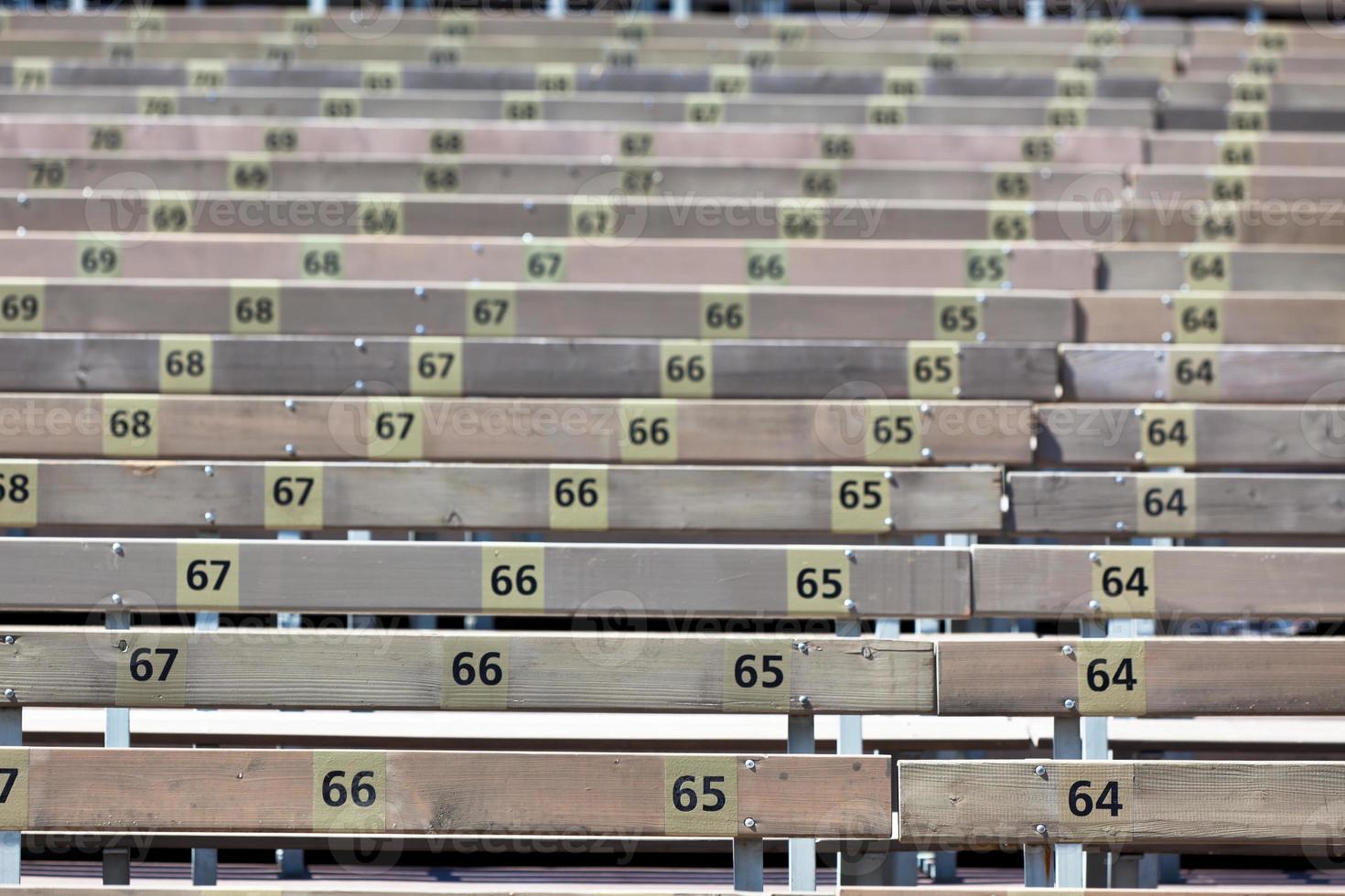 Wooden Grandstand Seats with Numbers photo