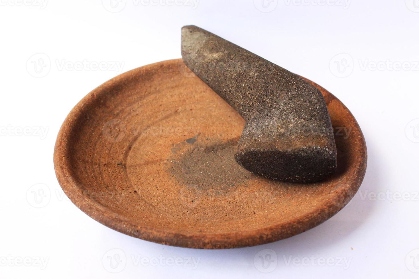 mortar and pestle traditional ornament object with isolated background photo