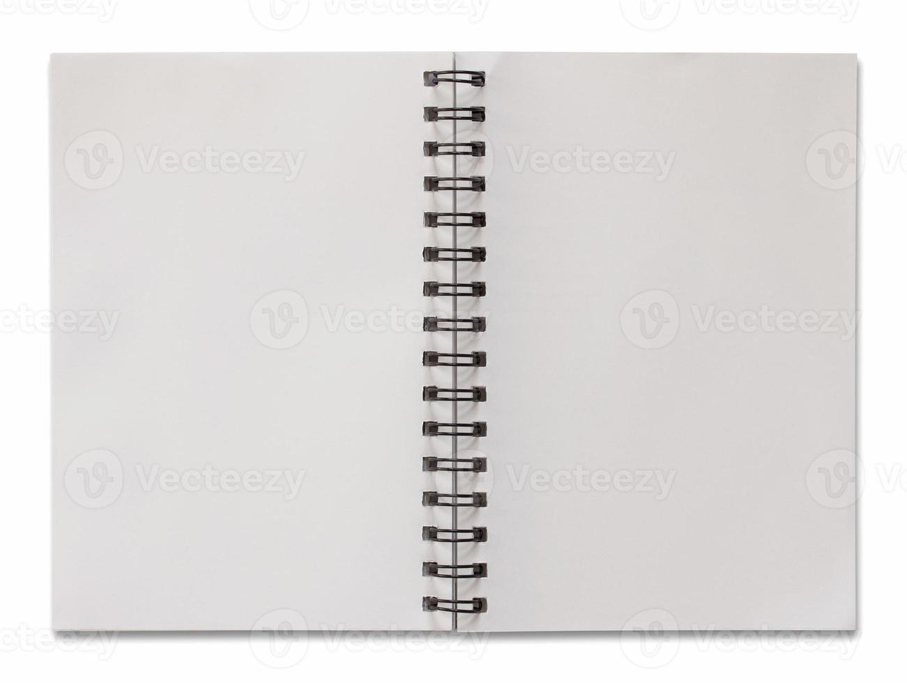 open spiral notebook isolated on white with clipping path photo