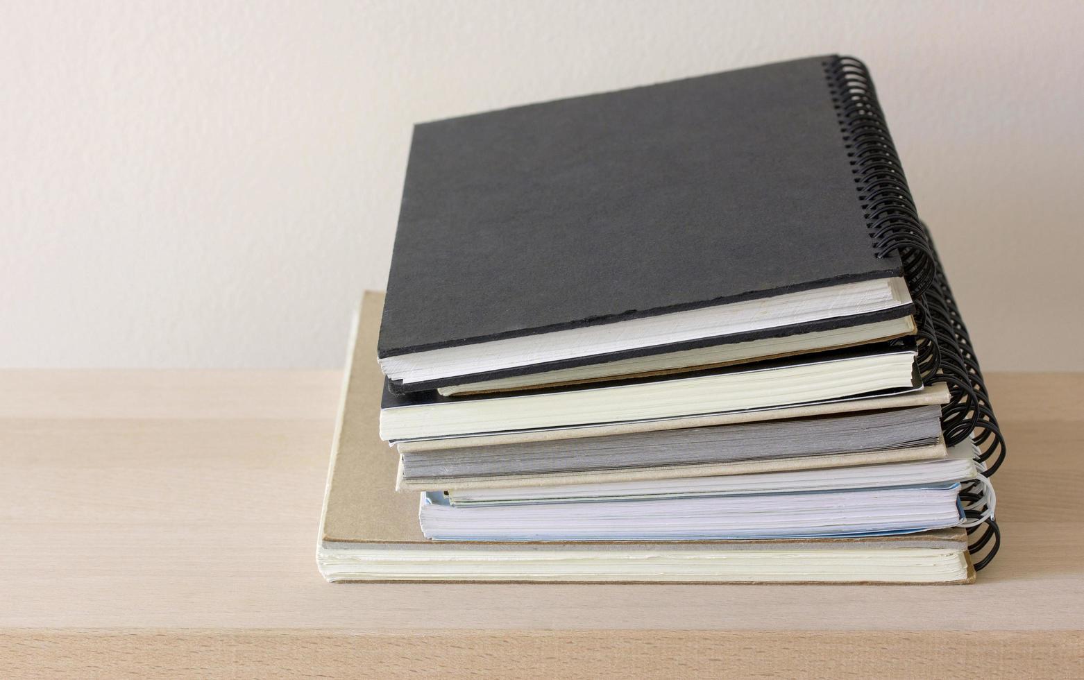 stack of spiral notebook photo