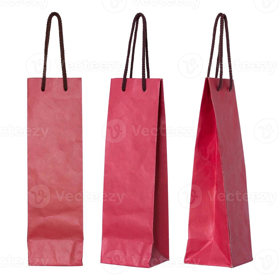 red paper bag for wine bottles isolated on white photo