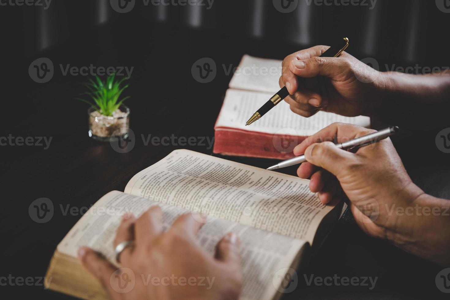 Young woman person hand holding holy bible with study at home. Adult female christian reading book in church. Girl learning religion spirituality with pray to god. concept of student education faith. photo