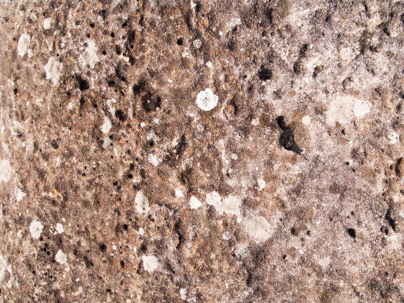 la textura de la piedra utilizada para imágenes de fondo, superficie de color marrón piedra foto
