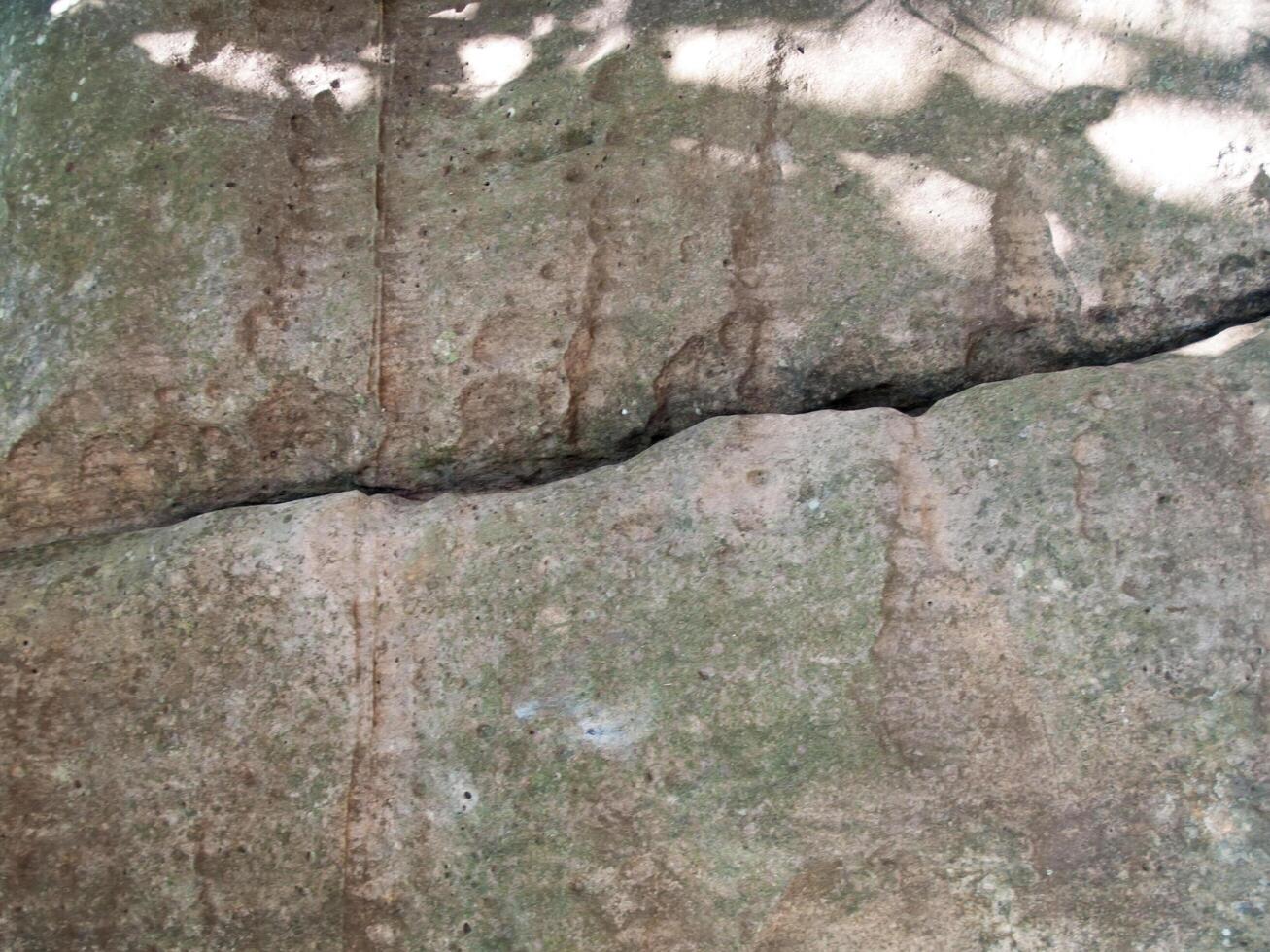 The texture of stone used for background images, Surface of stone brown color photo