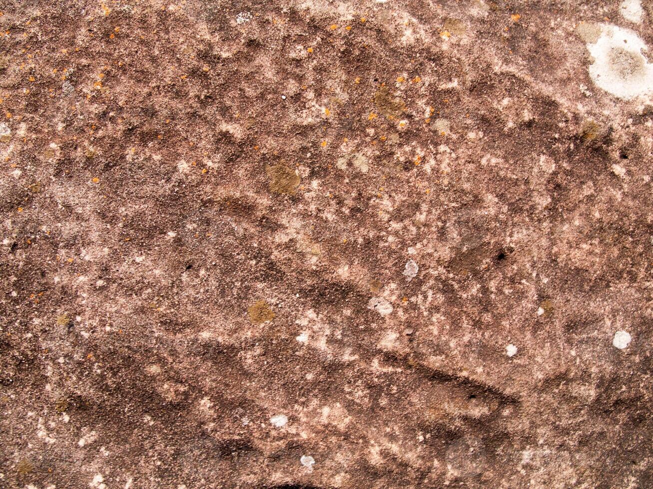 The texture of stone used for background images, Surface of stone brown color photo