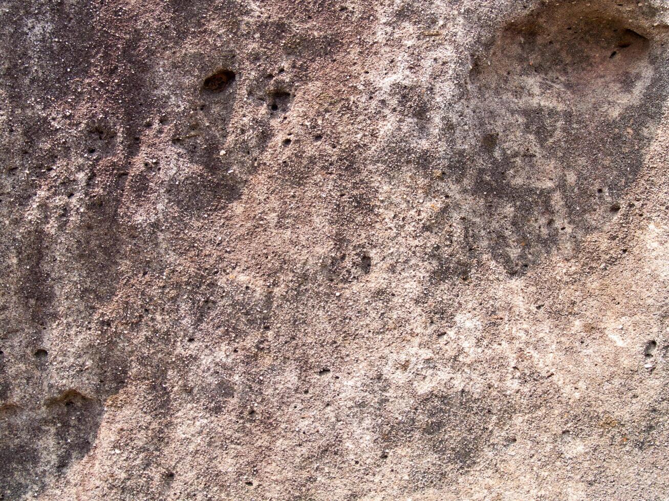 The texture of stone used for background images, Surface of stone brown color photo