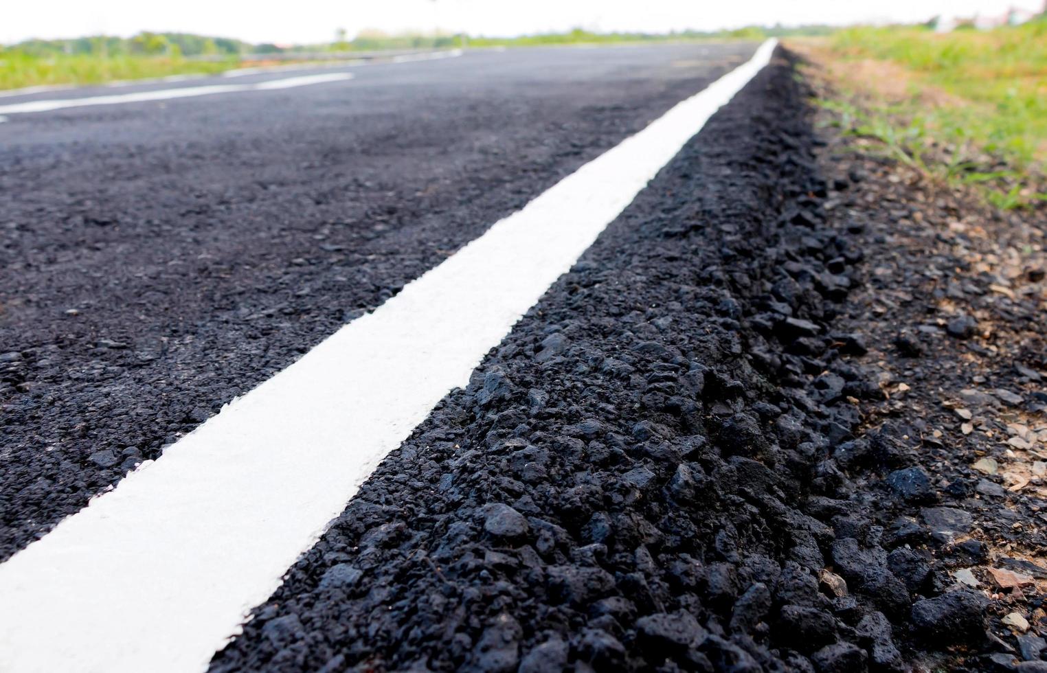 asphalt road in countryside photo
