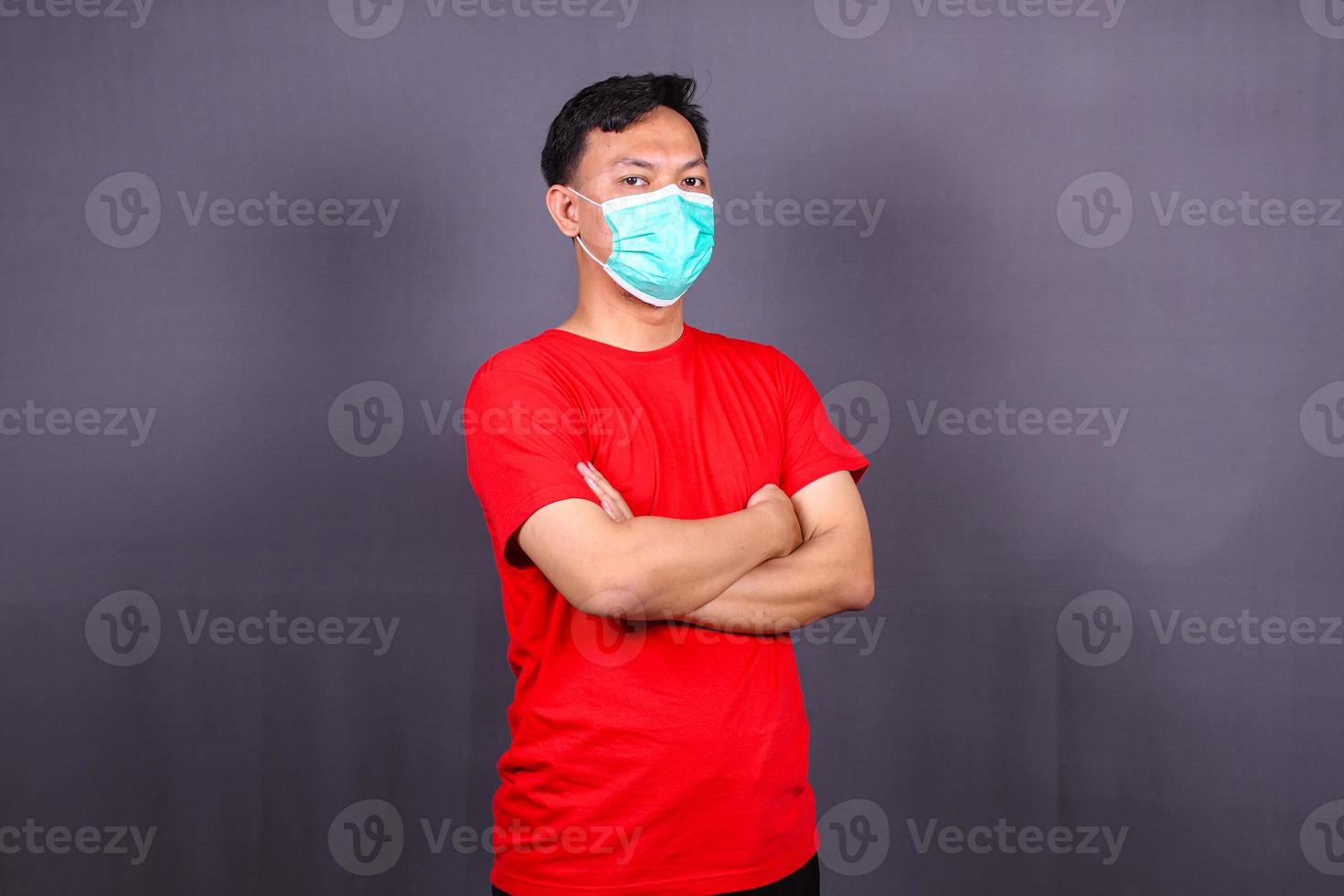Man wearing hygienic mask to prevent infection, airborne respiratory illness such as flu, 2019-nCoV. Isolated on white background photo