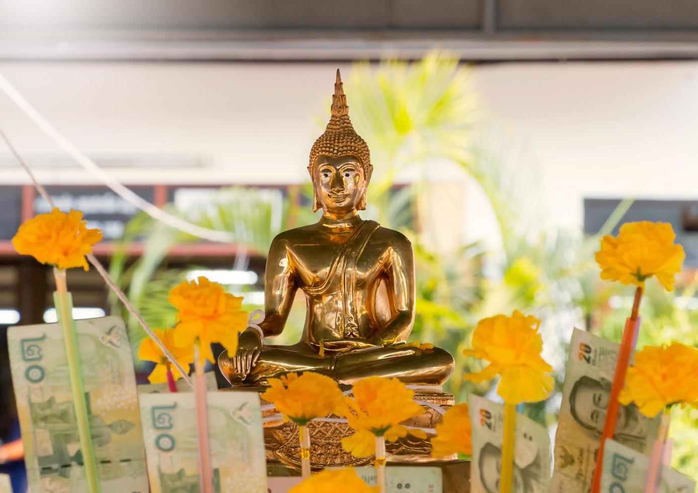 golden buddha on Thai new year day photo