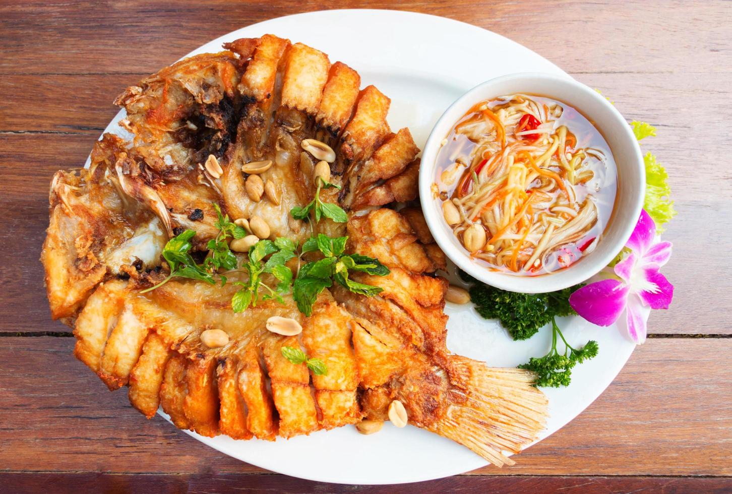fried fish on table photo