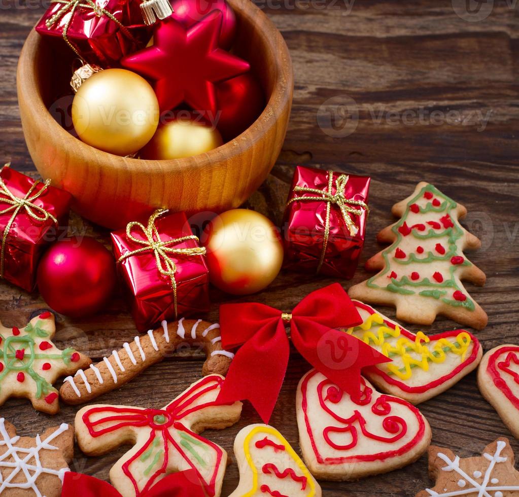 Knar and christmas food sweet cookies on wooden table background. Copy space. Selective focus. Happy new year concept. photo