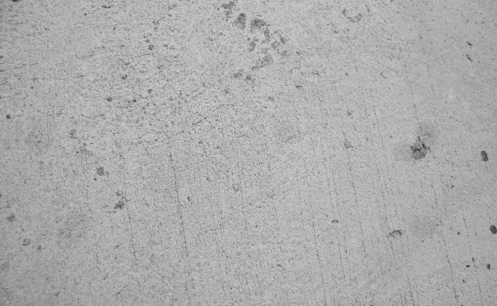Gray concrete surface. Dark rough textured plaster background. Stain and dirty concept. empty abstract background photo
