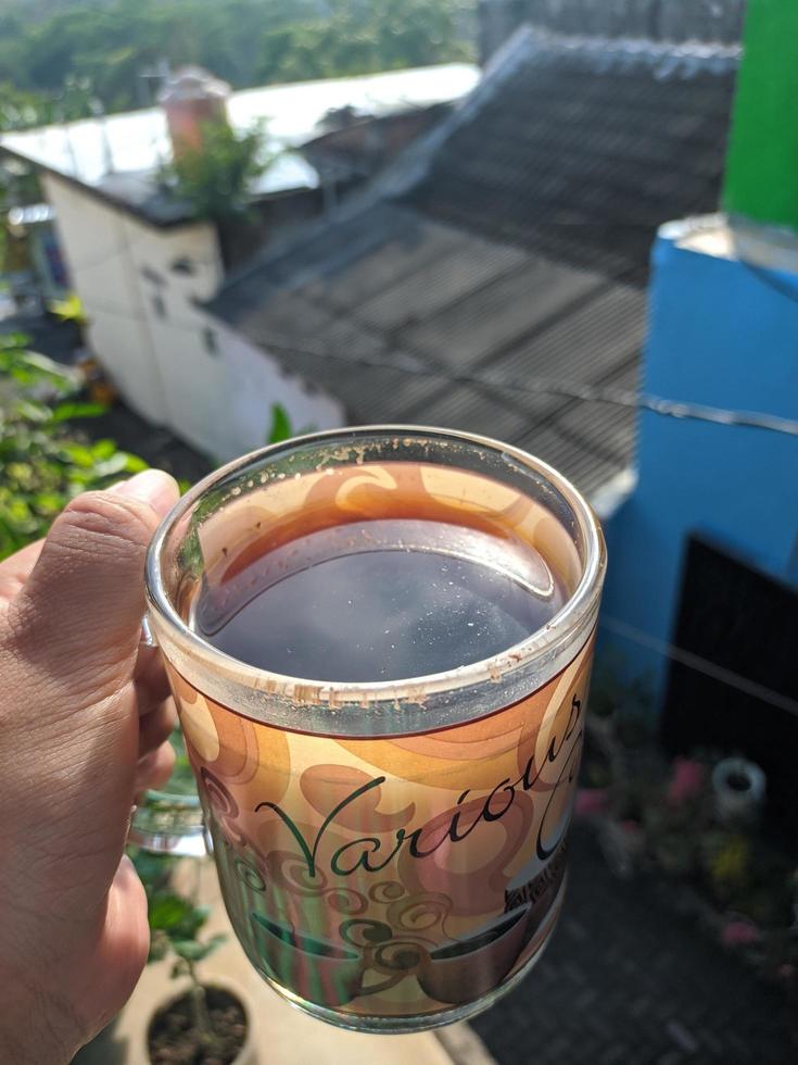 A cup of black coffee in the morning photo