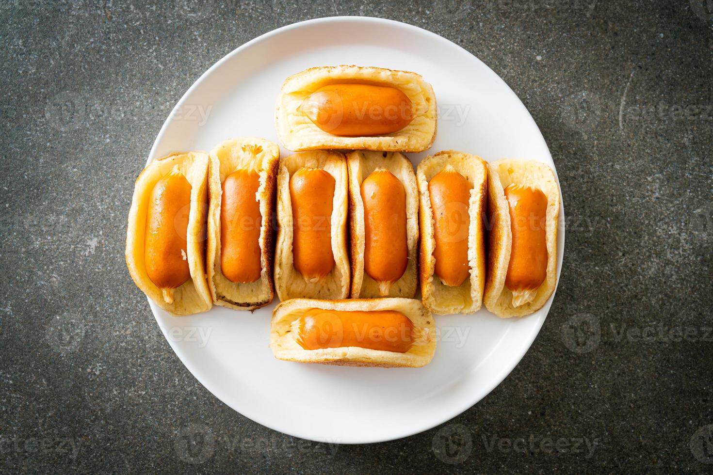 flat pancake roll with sausage photo