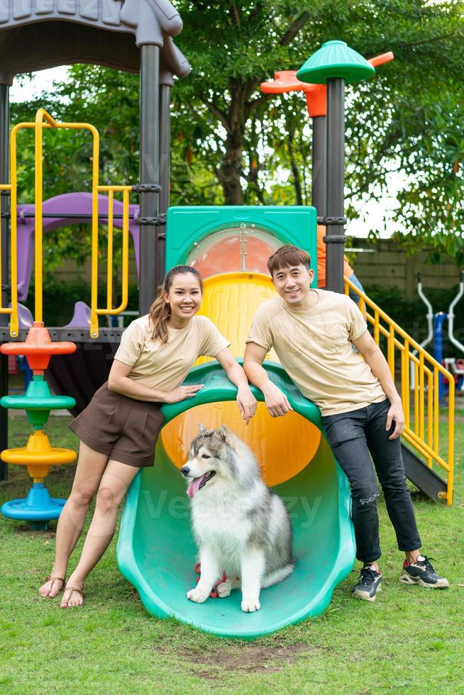 Asian couple love with dog photo