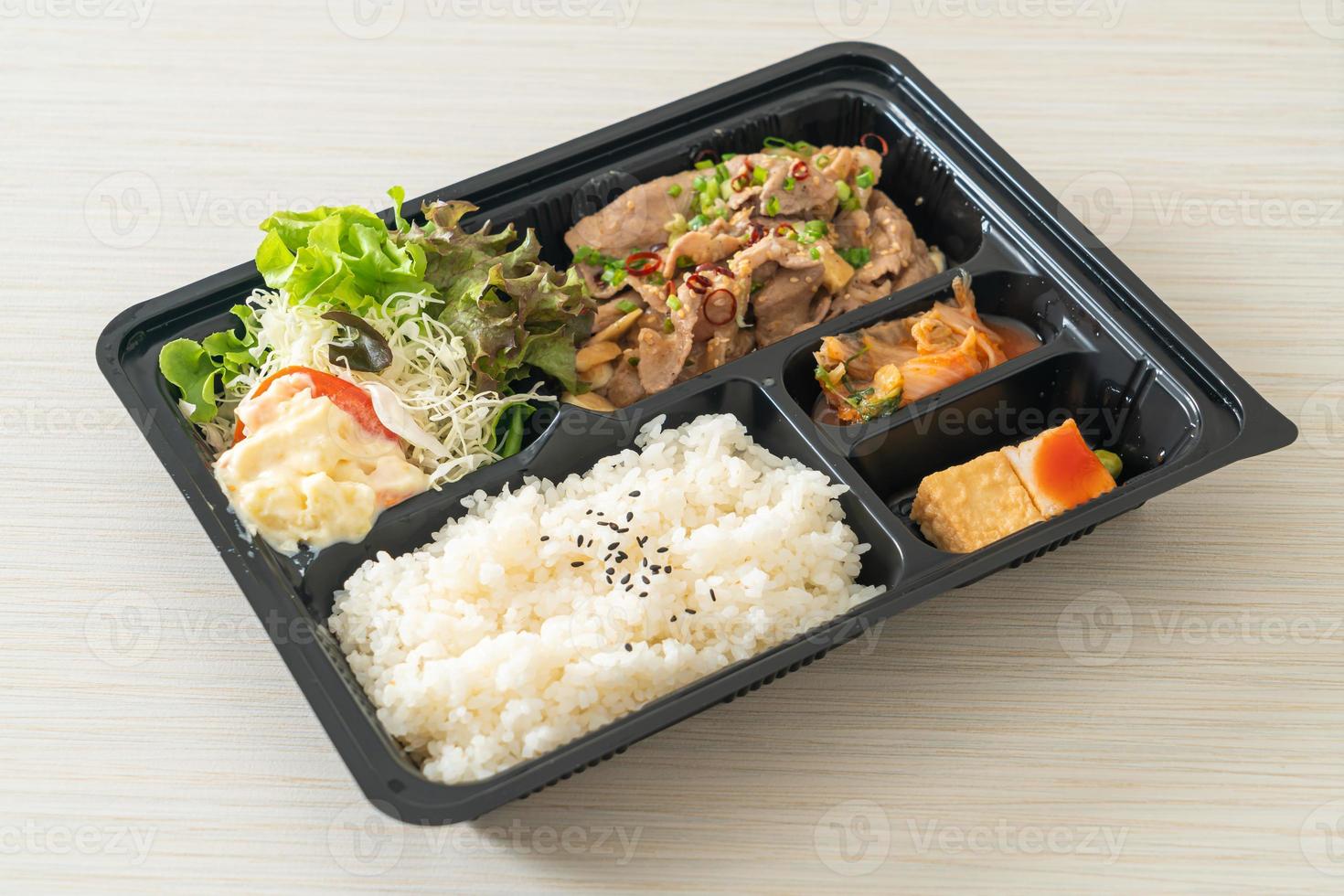 Japanese rice with pork yaki bento set photo