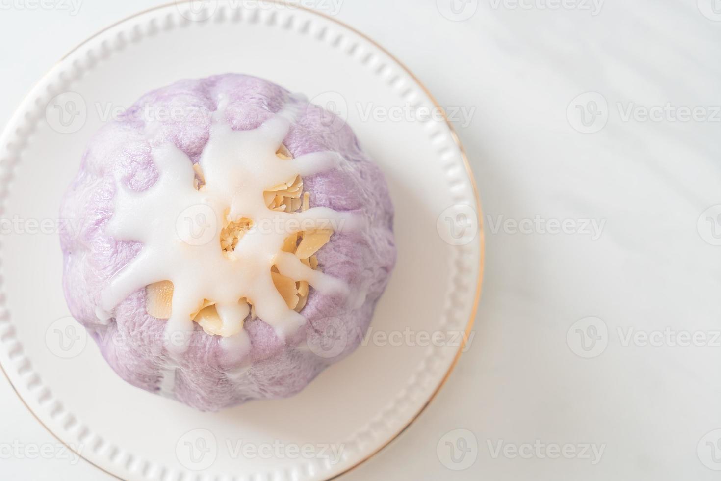 taro bun with white sugar cream and nut photo