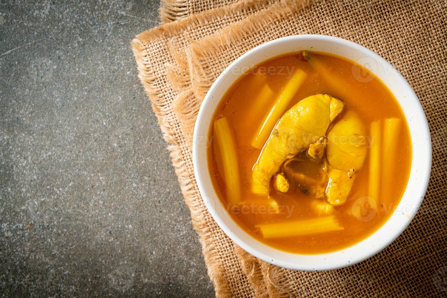 Sour soup with lotus stem and fish photo