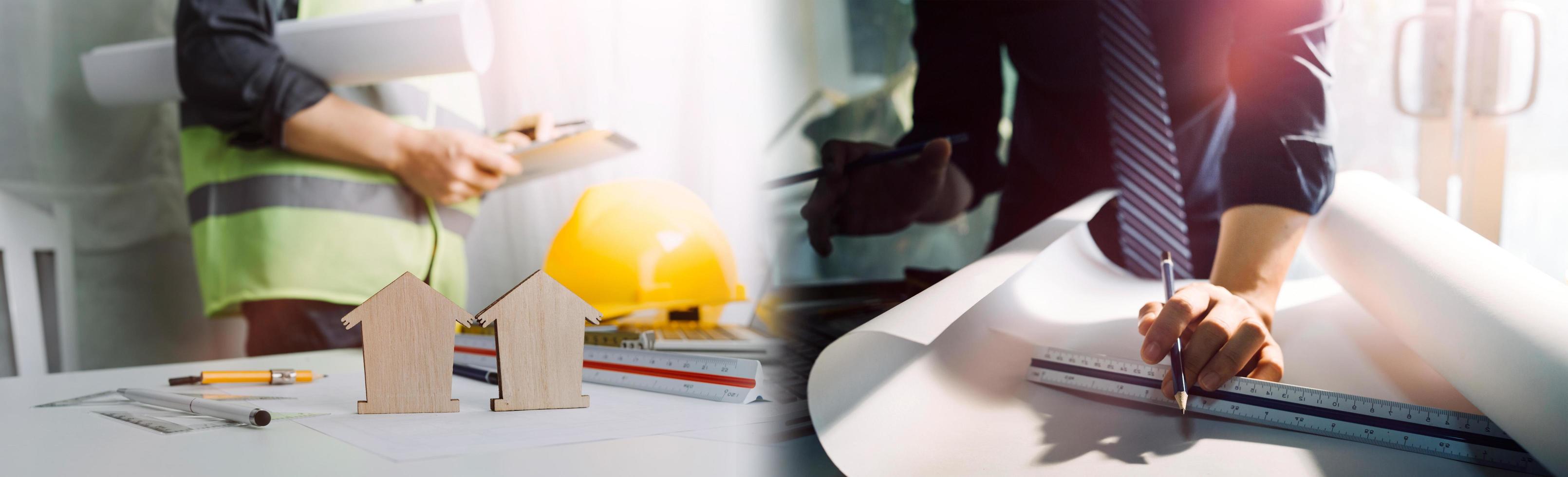 business hand working and laptop with on on architectural project at construction site at office desk in office photo
