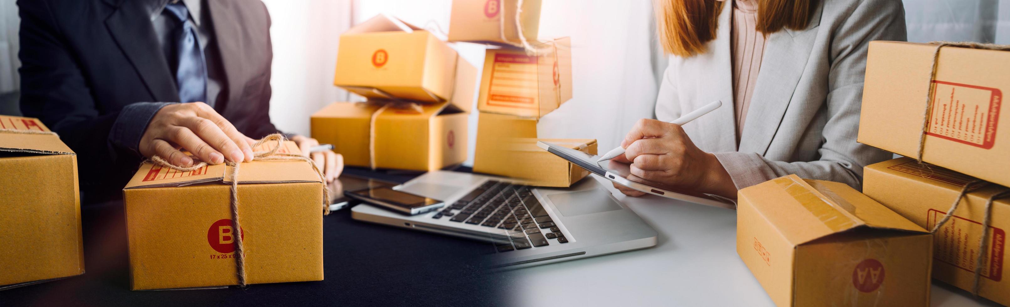 Business woman start up small business entrepreneur SME success .freelance woman working at home with Online Parcel delivery. SME and packaging deliveryconcept photo