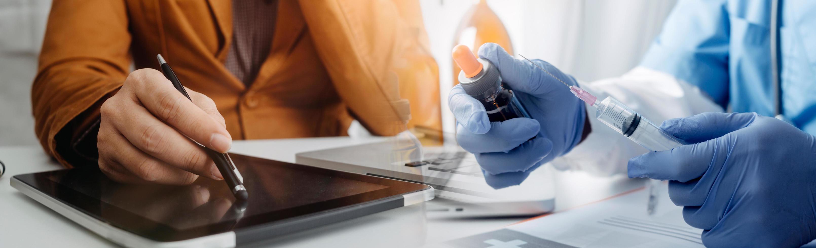 Medicine doctor hand working on a patients x-ray scans digital healthcare and connection with modern virtual screen interface icons, Medical technology and network concept. photo