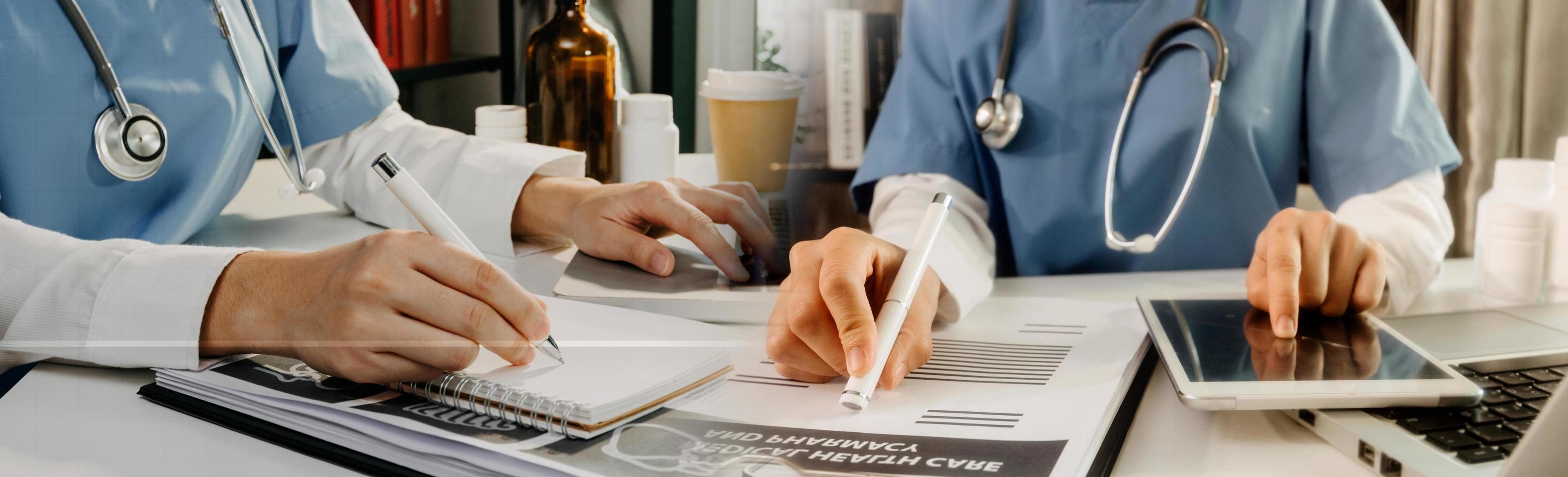 Medicine doctor hand working on a patients x-ray scans digital healthcare and connection with modern virtual screen interface icons, Medical technology and network concept. photo