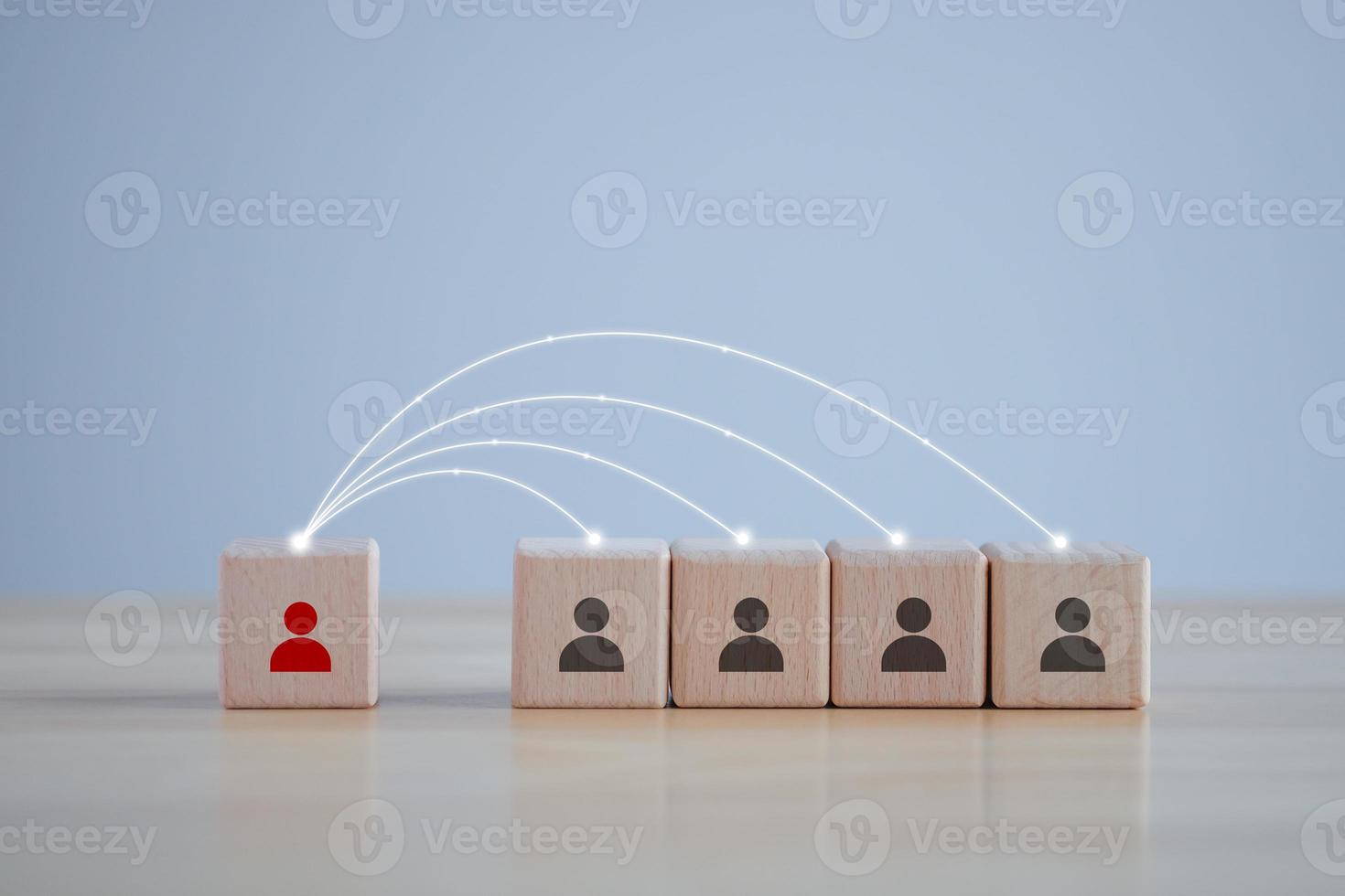 Teamwork. Successful team. Leadership. Coordination. Social connections. human person leader on wooden block with line connection symbol for spreads influence to team through a communication network. photo